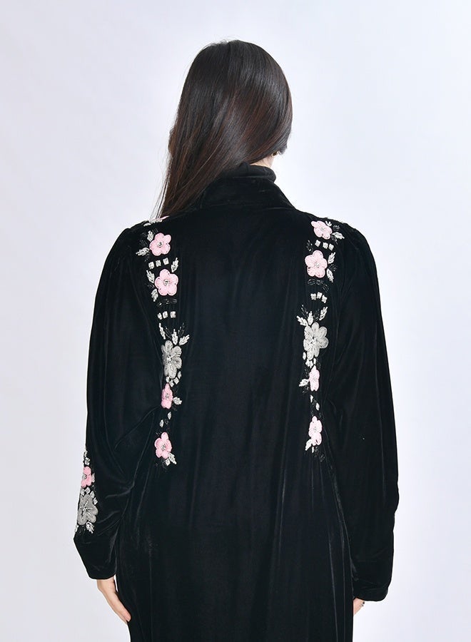 HAWRAA ABAYA Blossom abaya crafted from soft black velvet fabric, adorned with refined hand embroidery featuring delicate embellishments and floral motifs - Image 4